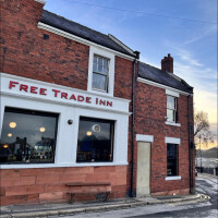 Free Trade Inn logo